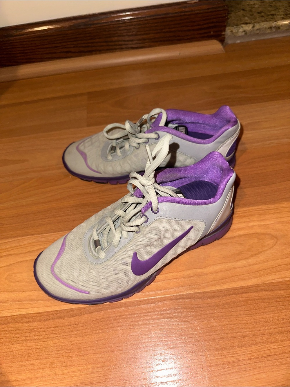 Nike Women’s Gray and Purple Athletic Trainers